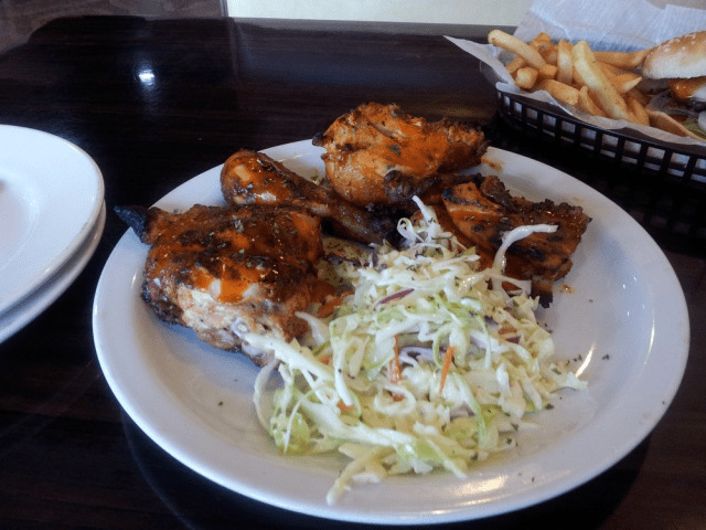 Charcoal Zyka chicken and salad in Halal Food Restaurants in Orlando Florida 
