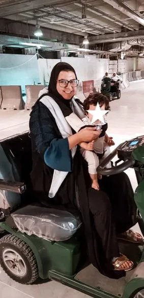 umrah with a baby renting a scooter in Haram