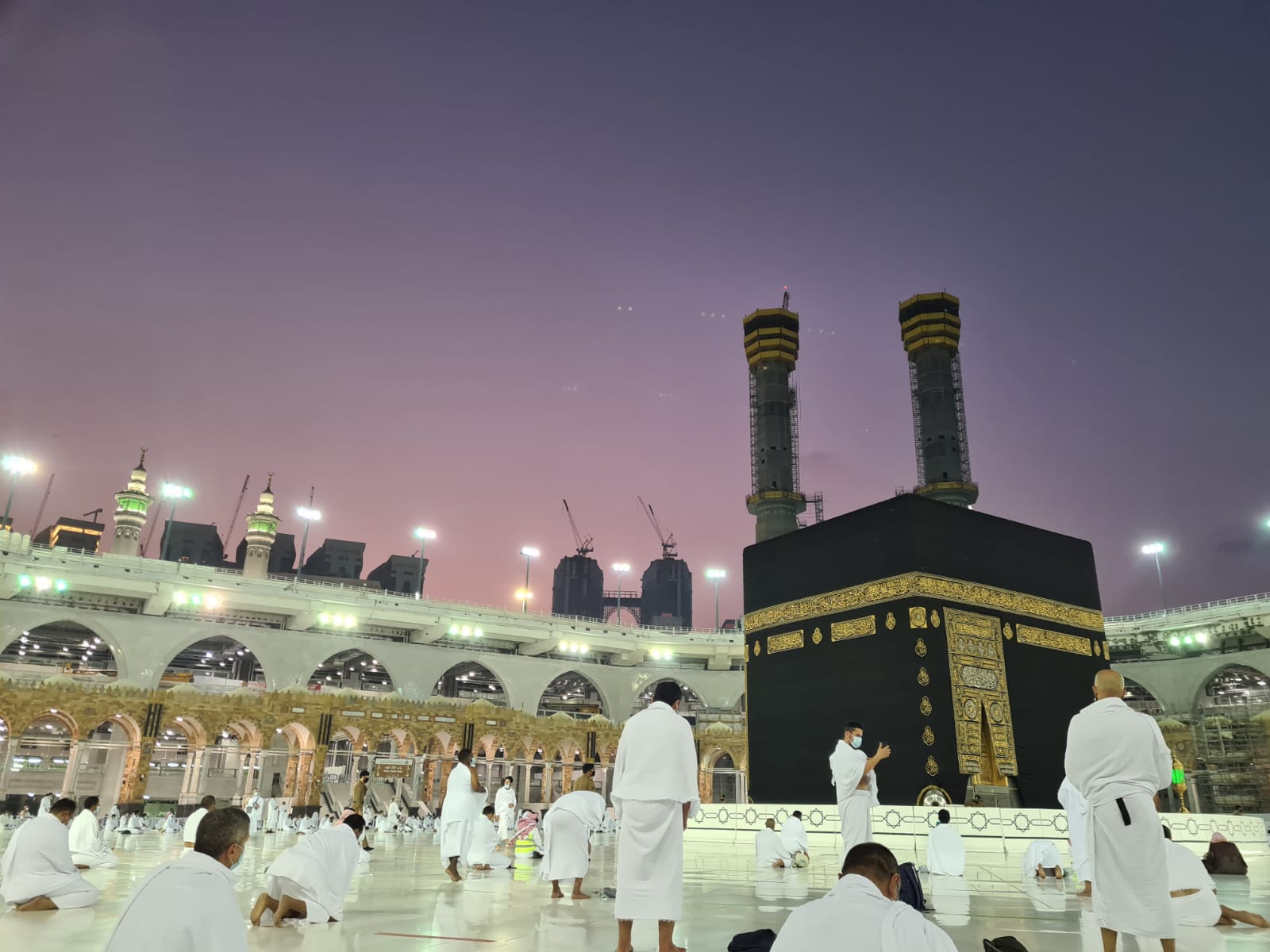 people praying with social distancing in Makkah during Umrah